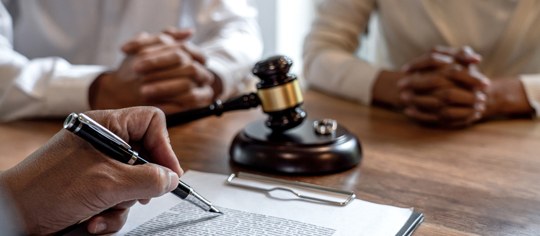 couple meeting with a divorce lawyer